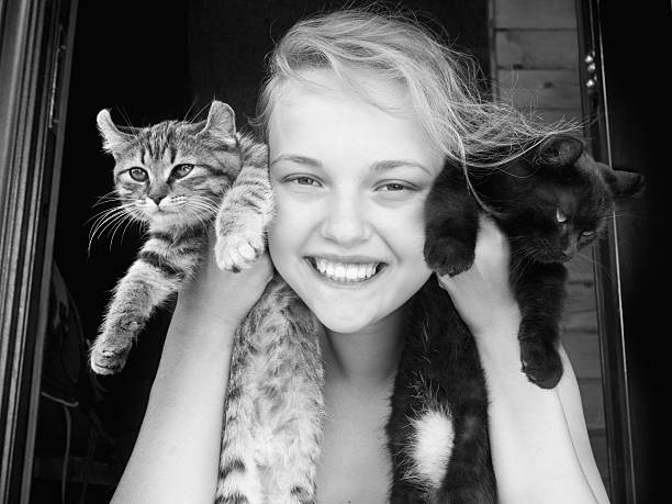 istock Girl and kittens 476077776