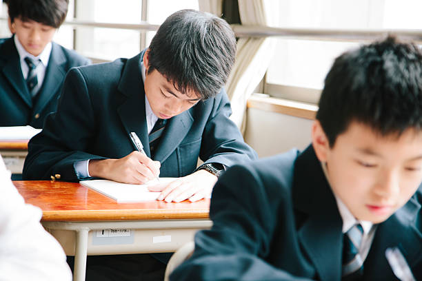 istock High school students, young male students working in classroom, Japan 476081378