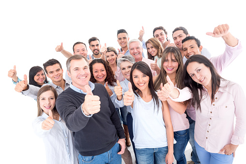 Happy group of casual Latin people with thumbs up liking something - isolated over white background