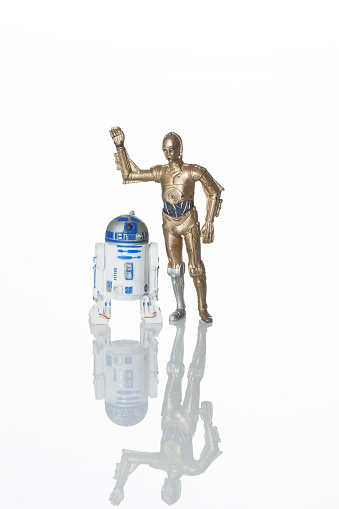 Cantonment, Fl, USA-June 1, 2015:  R2D2 and CP3O on white background, shot in studio, characters from Star Wars film franchise created by George Lucas