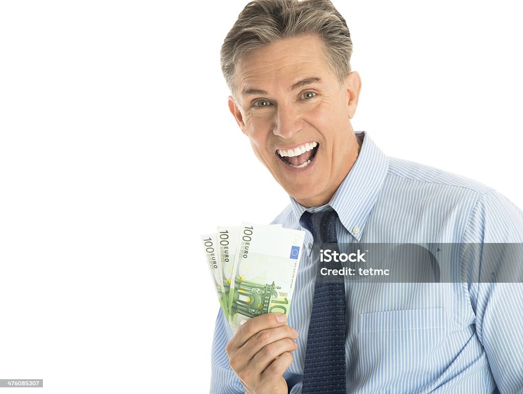 Portret radosny Biznesmen Trzymając Banknot 100 Euro Bankno - Zbiór zdjęć royalty-free (40-44 lata)
