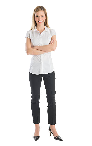 istock Young Businesswoman Smiling While Standing Arms Crossed 476085351