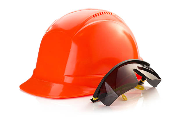 istock construction helmet and safety glasses on white 476085482