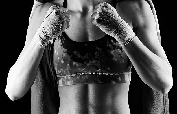 istock muscular woman in fight position 476086128