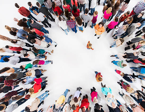 istock Above view of large group of people standing. 476089280