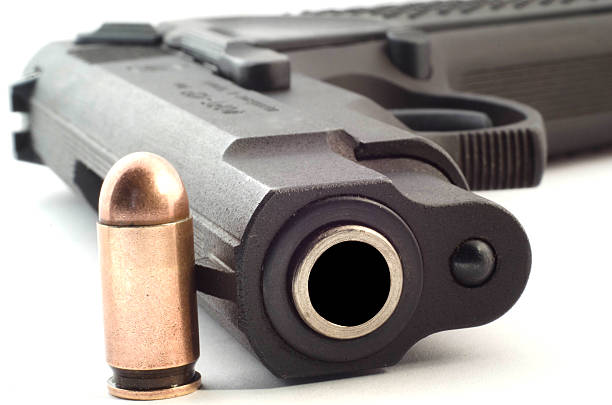 istock close view of handgun 476089566