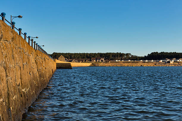 istock Burghead beach at high tide. 476090859