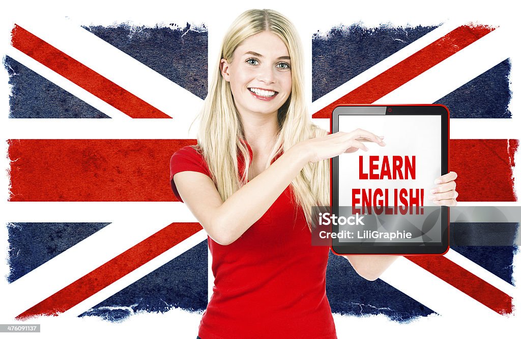 若い女性の手の英語概念の学習タブレット個 - イングランドのロイヤリティフリーストックフォト