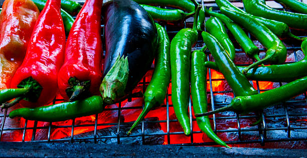 istock red and green peppers whit eggplant 476092248