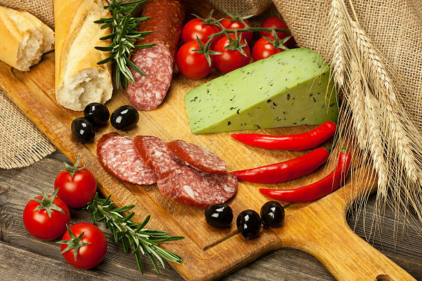 istock Baguette with salami and fresh cheese 476093719