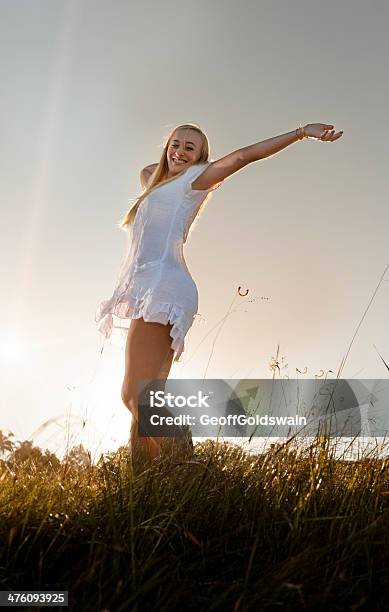 Young Healthy Girl Joy Sun Jumping Field Stock Photo - Download Image Now - 20-29 Years, Active Lifestyle, Activity