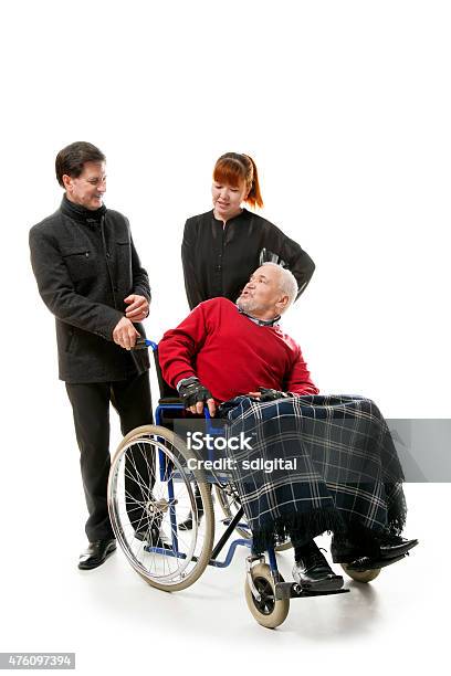 Man On Wheelchair Stock Photo - Download Image Now - 2015, 60-69 Years, 70-79 Years