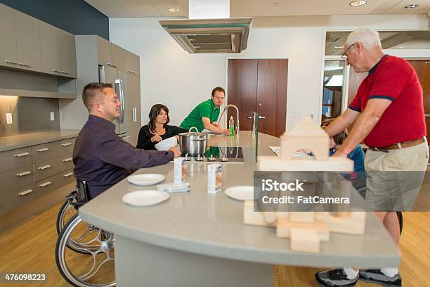 Cooking Stock Photo - Download Image Now - Cooking, Wheelchair, 40-49 Years