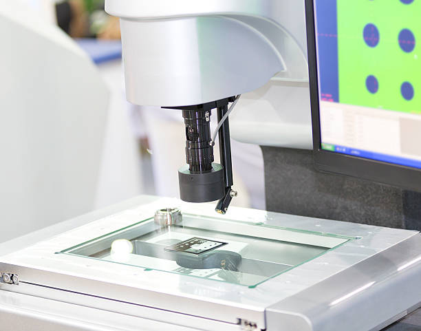 istock operator inspection automotive parts by vision measuring machine 476099372