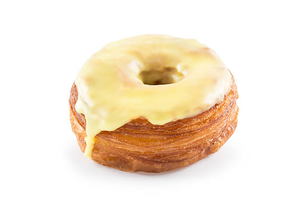 istock Yellow fondant croissant and donut mixture 476100229