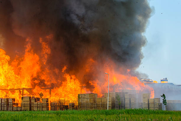 istock Pallet factory burning in industrial area 476101329