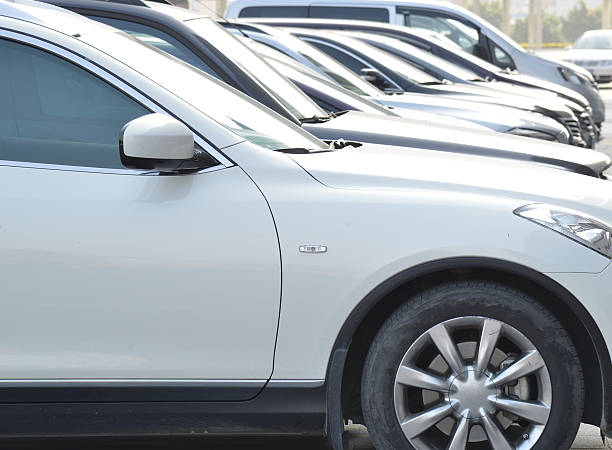 istock Cars row in a parking lot 476102587