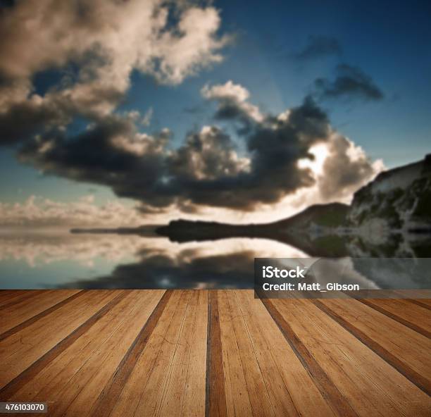 Sunrise Ocean Landscape Mupe Bay Jurassic Coast England With Woo Stock Photo - Download Image Now