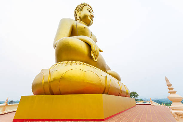 istock Large golden Buddha statue in chiang rai, thailand 476104296