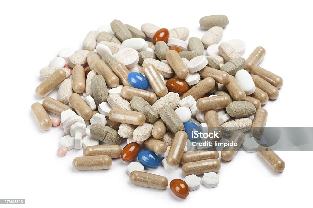 pills variety of colorfull pills and tablets on white background Addiction Stock Photo