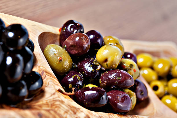 istock Variety of green, black and mixed marinated olives 476106011