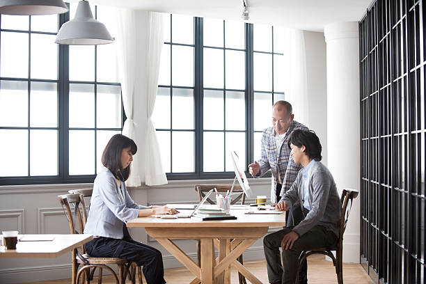 istock Business people working in modern Japanese office 476106716