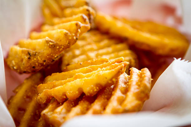 Waffle Fries Waffle Fries in Basket waffle stock pictures, royalty-free photos & images