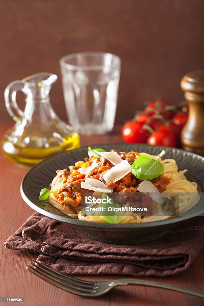 italian pasta spaghetti bolognese with basil on rustic table 2015 Stock Photo