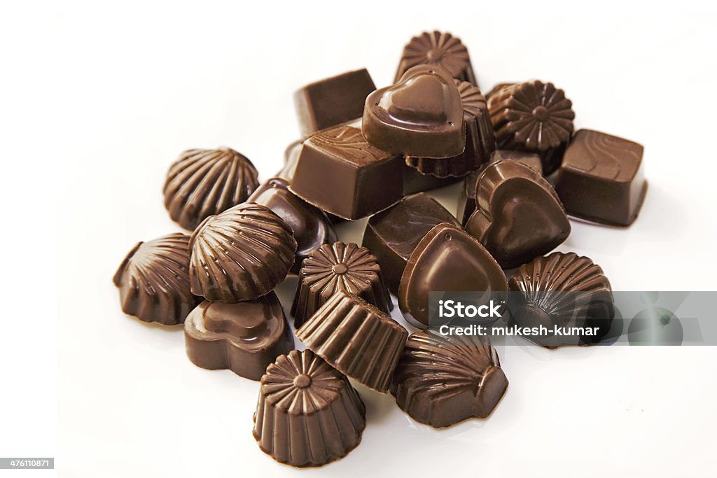 Pile of chocolate Pile of chocolate on white background Baking Stock Photo