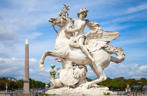 Mercury riding Pegasus sculpture of Tuilerie Garden, Paris, France. Originally it was build in 1701â1702 by Antoine Coysevoxin, and now replaced by a copy