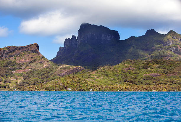 istock Bora-Bora, Polynesia. Mountains, the sea, palm trees 476117312