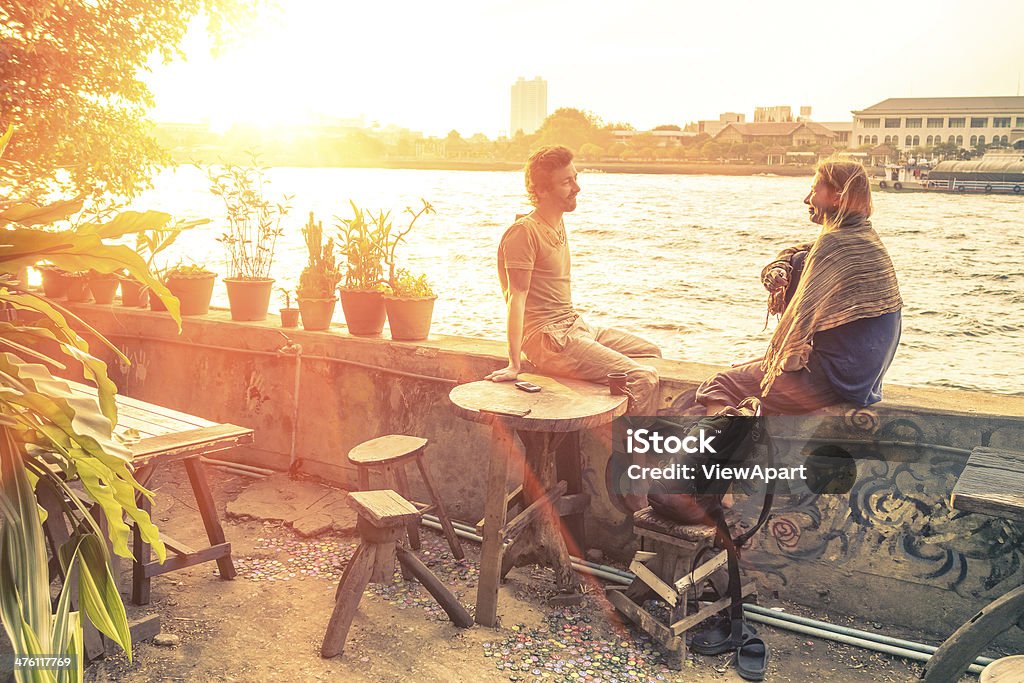 Couple of friends talking at Sunset Couple - Relationship Stock Photo