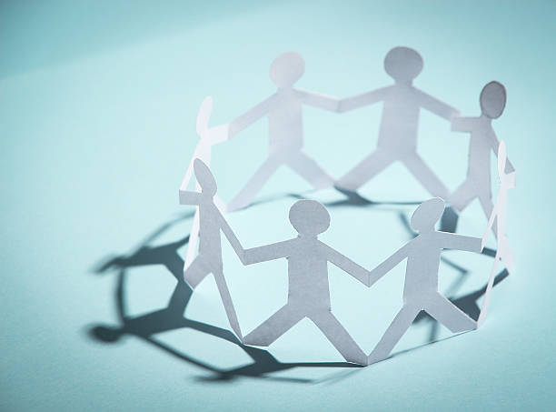 istock Group of people holding hands 476118824