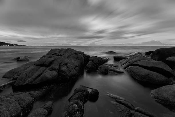 istock seascape dark sunset light  thailand beach b & w 476122754