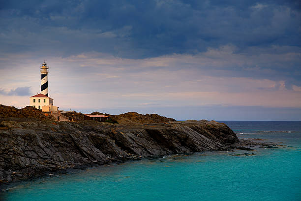 Cap de Favaritx sunset lighthouse cape in Mahon at Balearic Islands of Spain