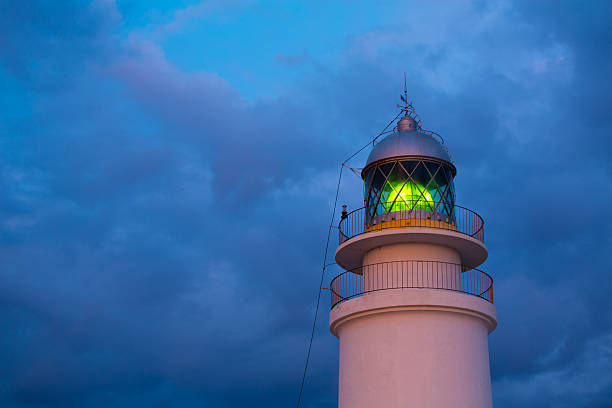 istock Menorca sunset at Faro de Caballeria Lighthouse 476125132