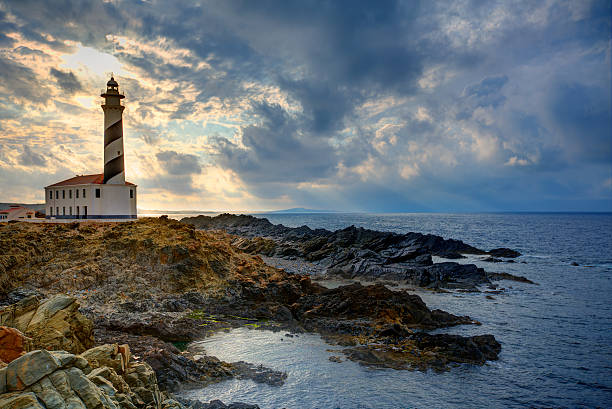 istock Cap de Favaritx sunset lighthouse cape in Mahon 476125420