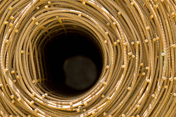 istock Roll of rusty steel wire mesh for construction. 476131846