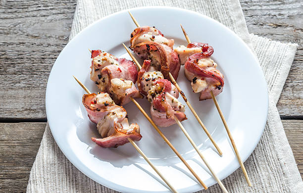 istock Grilled bacon skewers with chicken meat 476134947
