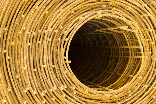 istock Roll of rusty steel wire mesh for construction. 476135804