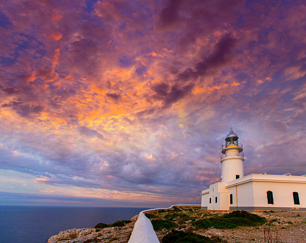 istock Menorca sunset at Faro de Caballeria Lighthouse 476137102