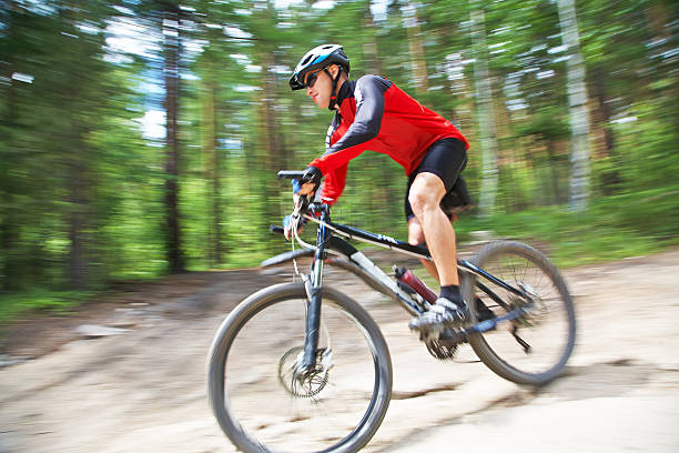 istock male riding a mountain bike 476140064