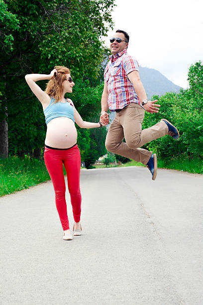 istock Happy family jumping 476140066
