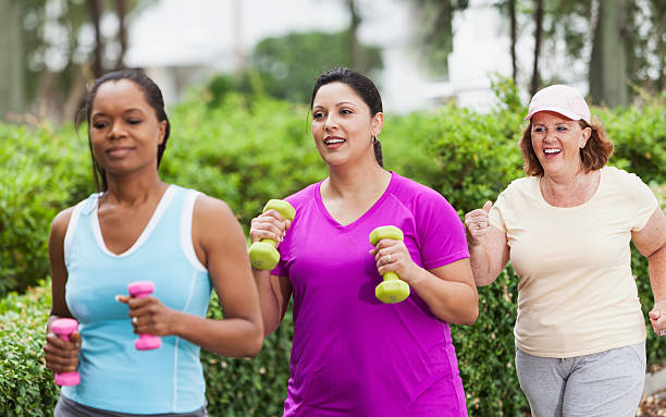 istock Women exercising in park 476140677