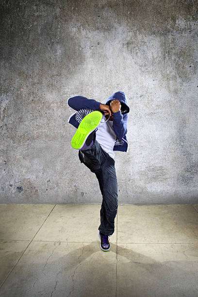 istock Hooded Man Kicking 476141312