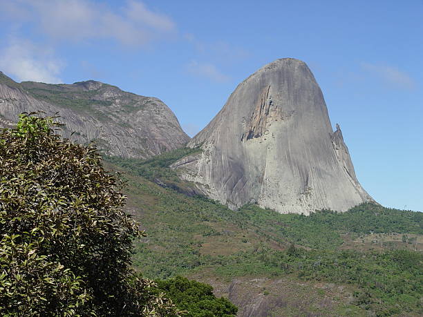 istock Mountain with a piece of rock shaped lizard climbing 476142095