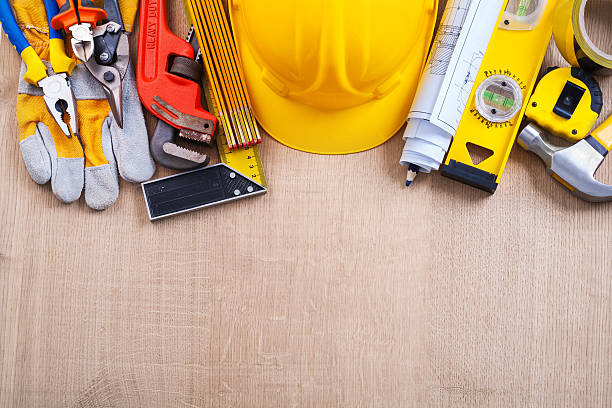 istock Group of building objects on oak wooden board construction conce 476143744