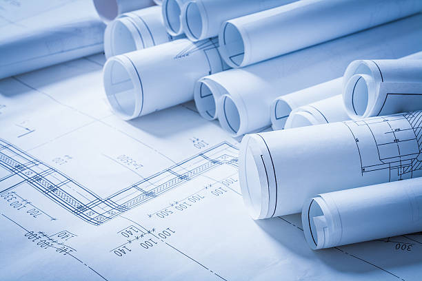 istock Heap of engineering construction drawings building concept 476143788