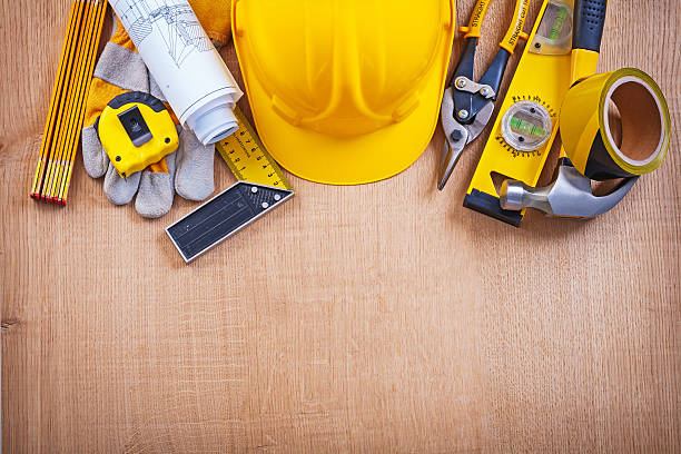 istock House improvement tools on oak wooden board construction concept 476143798