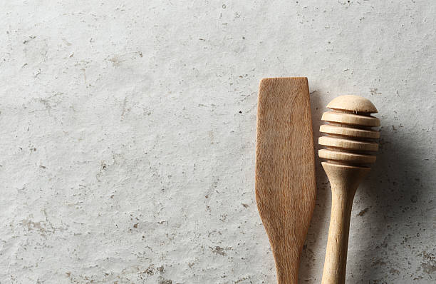 istock Wooden dipper kitchenware on white wood board background 476143904